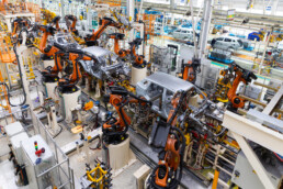 Car bodies are on assembly line. Factory for production of cars. Modern automotive industry. Electric car factory, conveyor - a href=httpswww.freepik.comfree-photocar-bodies-are-assembly-line-factory-production-cars-modern-automotive-industry-electric-car-factory-conveyor_26151287.htm#from_view=detail_alsolikeImage by usertrmk on Freepika