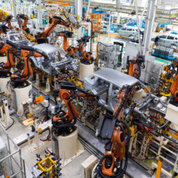 Car bodies are on assembly line. Factory for production of cars. Modern automotive industry. Electric car factory, conveyor - a href=httpswww.freepik.comfree-photocar-bodies-are-assembly-line-factory-production-cars-modern-automotive-industry-electric-car-factory-conveyor_26151287.htm#from_view=detail_alsolikeImage by usertrmk on Freepika